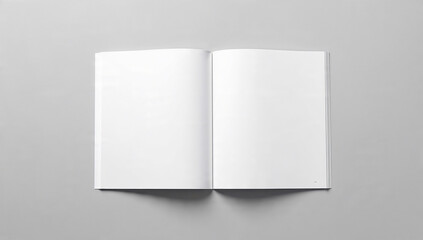 Fototapeta premium Open blank white book with clean edges on neutral gray background, top view, concept for design templates, branding mockups