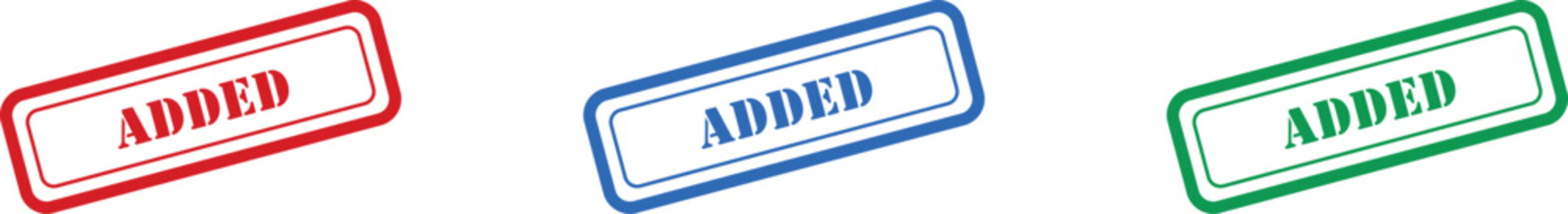 Three rectangular rubber stamps featuring the clear word ADDED displayed in contrasting red, blue, and green