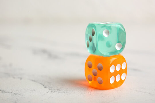 Different dices on light background