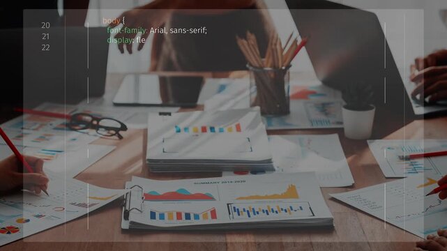 A dynamic workspace featuring a laptop, charts, and code, emphasizing teamwork and productivity in a modern office setting. Ideal for business or tech themes. Raster