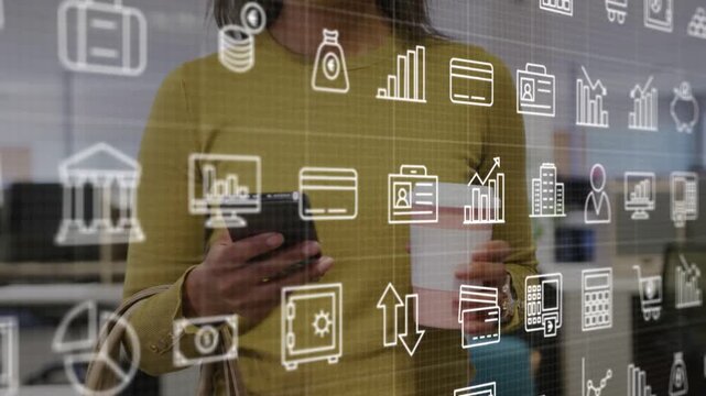 Woman tapping smartphone, holding coffee, viewing finance icons overlaying transparent display