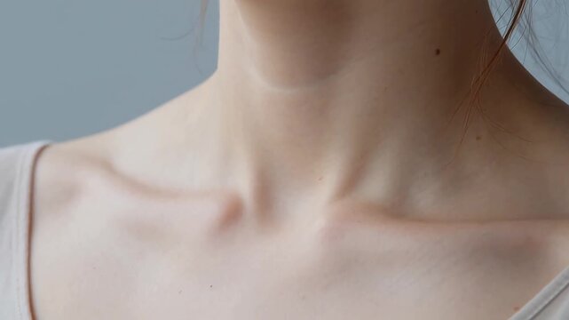 Closeup of a persons neck and shoulders