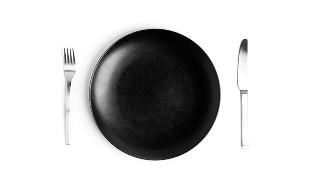 Sign language with cutlery. A plate with cutlery isolated on a white background. Plate, knife, fork on a white background.