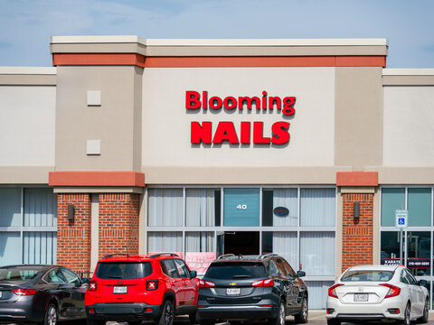 Camillus, NY - Apr 18, 2026: The exterior of Bloom Nails Solan at Township 5 Plaza. is a local business known for (blooming gel or blosson gel)