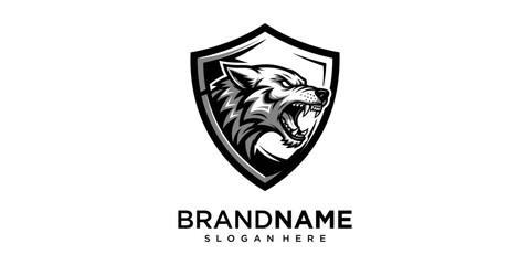 Obraz premium A fierce wolf head logo on a shield with brandname and slogan