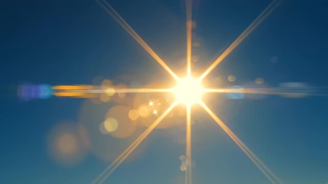 Bright sunburst in blue sky emphasizing natural beauty and pristine environments