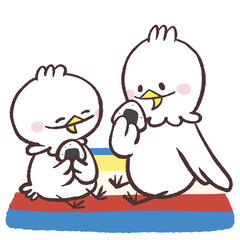 シートの上でおむすびを食べる白い鳥達のイラスト © おひさまストック