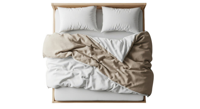 Top view of messy bed with brown blanket