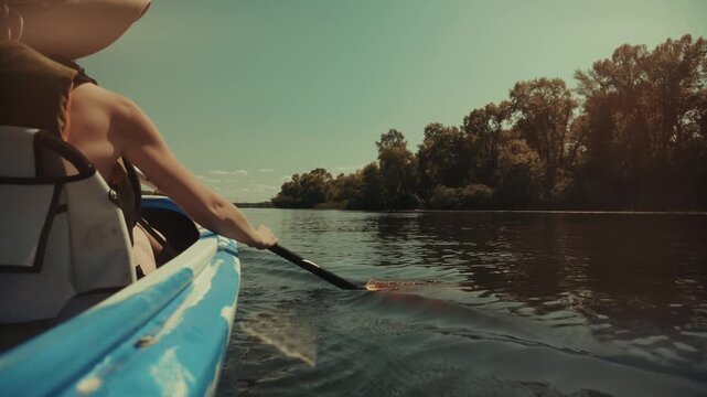 Traveler Paddling  Kayak on Calm River. Rowing Activity for Tourism and Adventure