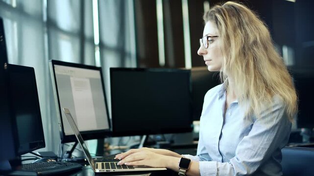 Businesswoman Working On Laptop In Office. Executive Career And Corporate Workplace Scene. Business Technology