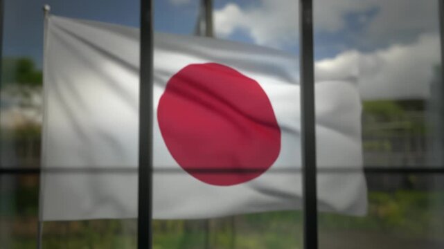 曇った窓と日本国旗が映す不透明な未来
