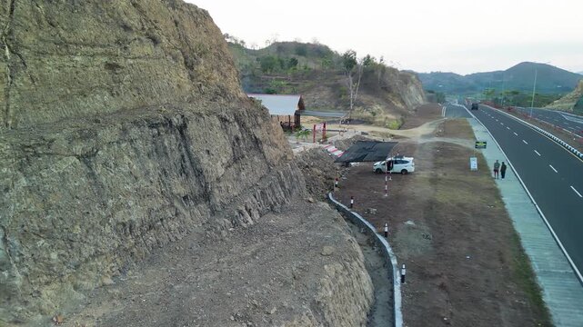 Stunning aerial view of Jl Bypass BIL Mandalika road during sunset in Lombok