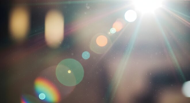 Bokeh sun flare background with dust and soft light flares