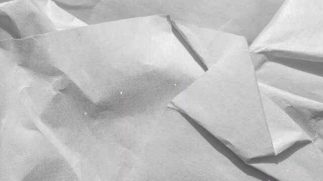 Abstract background of crumpled white paper texture with soft shadows animated background