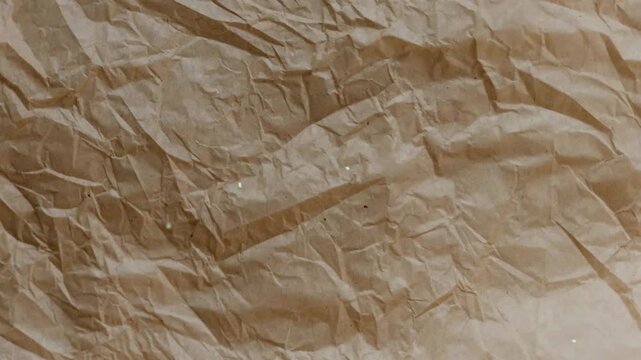 Crumpled brown craft paper texture background animated background