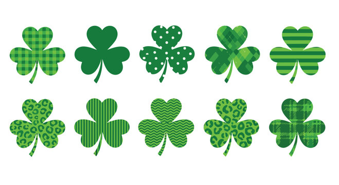 Collection of green four-leaf clovers with different patterns and textures on a white background for good luck