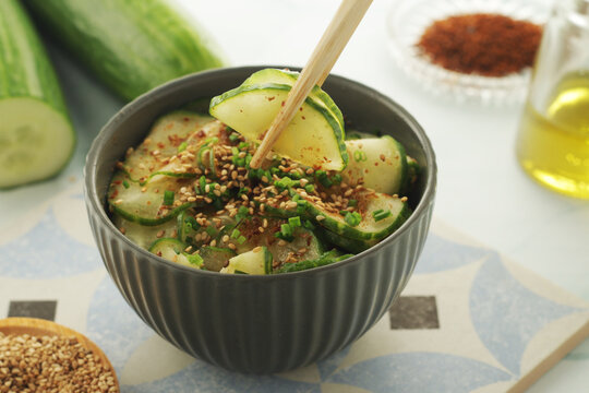 A bowl with Korean cucumber salad Oi Muchim