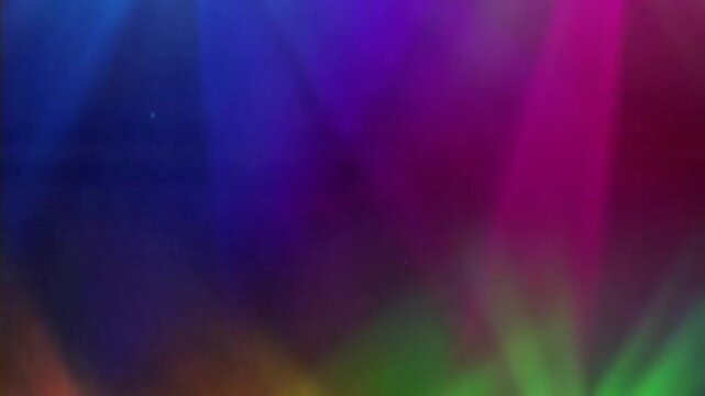 Abstract background video featuring the gentle movement of light with a dynamic and elegant blend of blue, red, and purple colors. 