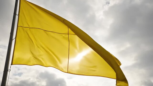 Yellow flag waving in sky emphasizing natural beauty and pristine environments