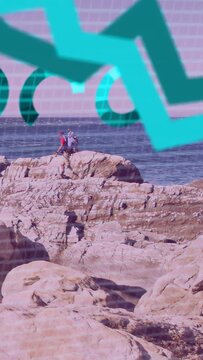 Vertical video: Hikers moving on rock while grid sparking bar rise over hikers showing biz growth