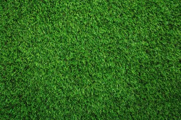 Fototapeta premium High resolution top view of green artificial grass turf texture for garden landscape design and sports field surface. High quality photo