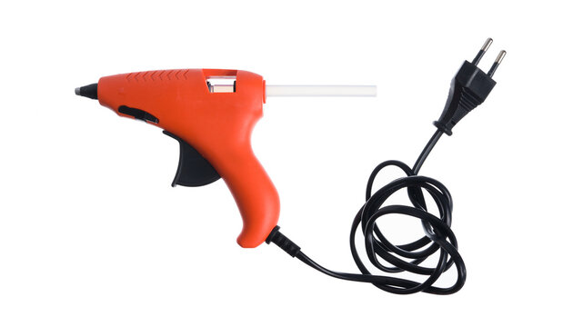 Glue gun and sticks isolated on white background