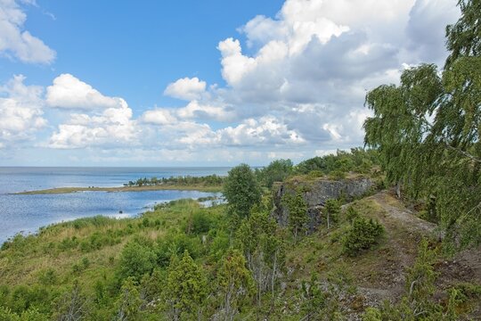 Scenic coastal cliff landscape at &Uuml;&uuml;gu Bluff (&Uuml;&uuml;gu pank) on the island of Muhu in cloudy summer weather, Estonia, Europe.
