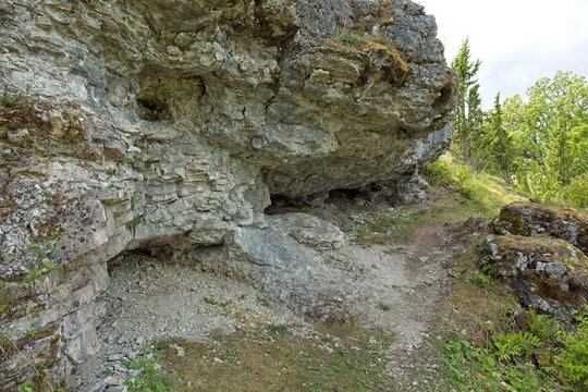 Scenic coastal cliff landscape at &Uuml;&uuml;gu Bluff (&Uuml;&uuml;gu pank) on the island of Muhu in cloudy summer weather, Estonia, Europe.