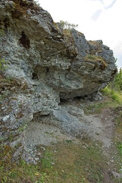 Scenic coastal cliff landscape at &Uuml;&uuml;gu Bluff (&Uuml;&uuml;gu pank) on the island of Muhu in cloudy summer weather, Estonia, Europe.