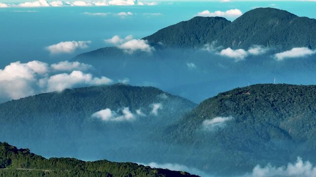 Aerial view above the sea of ​​clouds with the sunset