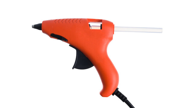 Glue gun and sticks isolated on white background