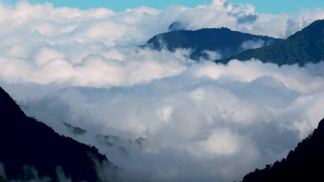 Aerial view misty foggy mountain landscape with clouds