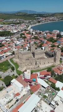 Aerial View of Candarli Castle and Coastal Town at Sunny Day, Izmir, Turkey. High quality 4k footage