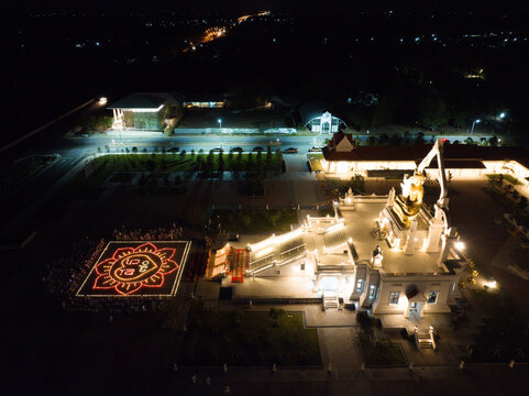 Lopburi, Thailand, April 12, 2025, Puttha Sathan Lopburi Sri Suvarnabhumi - Top down aerial view of illuminated temple grounds in Lopburi