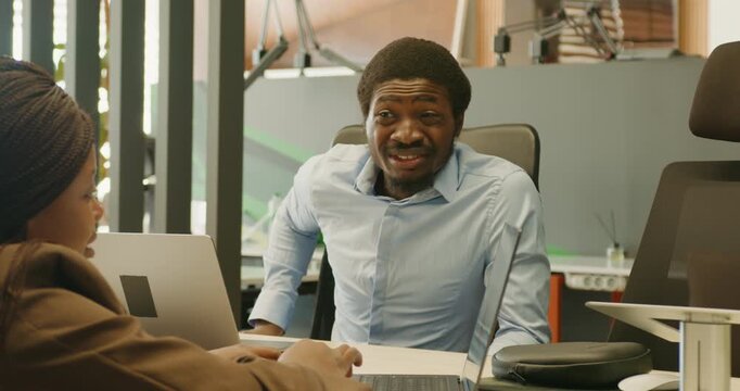 Motivated startup creator negotiating agreement passionately with investor