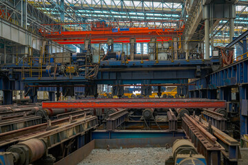 Fototapeta premium The fiery steel billet, the core moment of the rolling mill production line