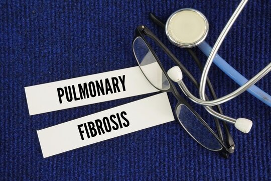 Stethoscope with the words Pulmonary fibrosis is a chronic, progressive lung disease characterized by scarring and stiffening of tissue around the air sacs