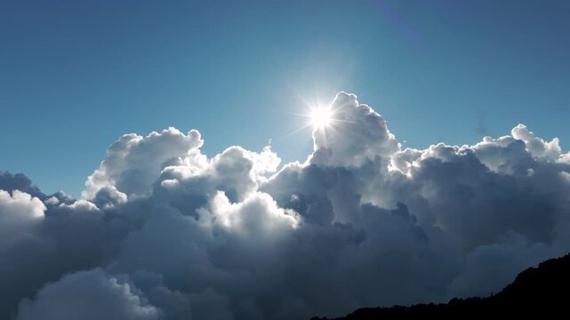 Aerial view above the sea of ​​clouds with the sunset