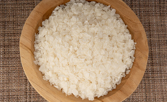 Raw flattened rice. Dry rice flakes or poha, Indian breakfast food
