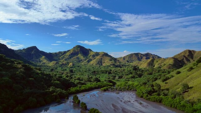 Komodo island natural landscape hills, green forest. Nice aerial view drone