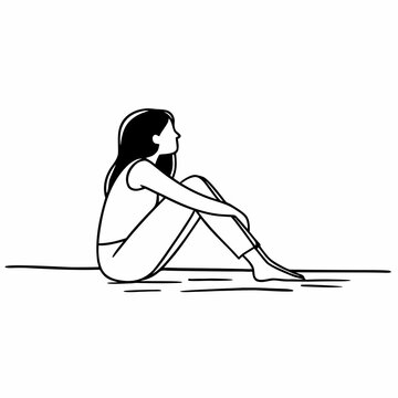 A woman sitting on the floor with her legs bent