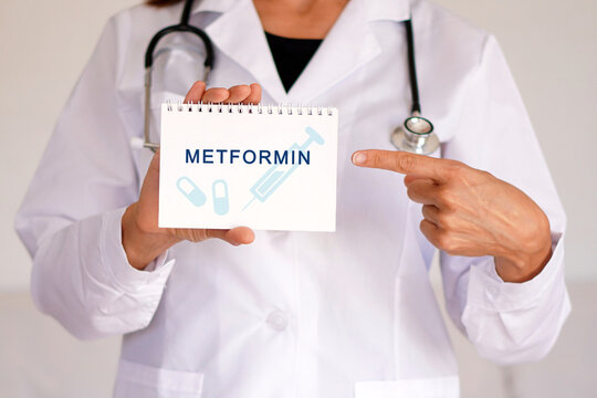 metformin. Health professional pointing to a medical notebook. Longevity medicine concept.