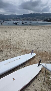 surfboards on the beach, Beluso, Bueu, Pontevedra, Galicia, Spain