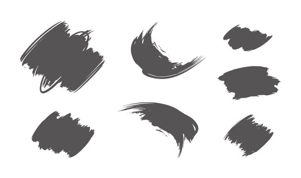 Collection of seven dark grey abstract brush stroke shapes paint