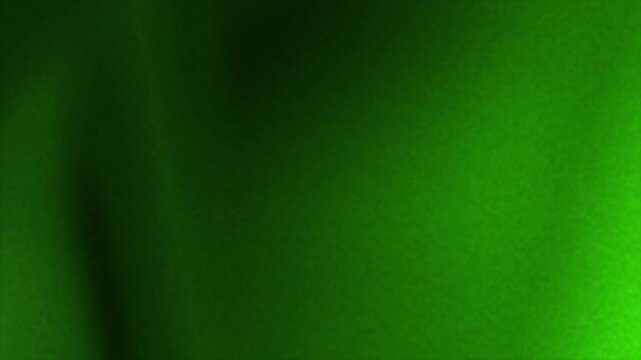Abstract green gradient with a slight dark shadow, ideal for backgrounds, website designs, digital art projects, and presentations. Vibrant and calming aesthetic.