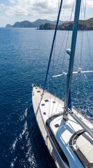 Fototapeta premium Luxury yacht sailing in the ocean near islands