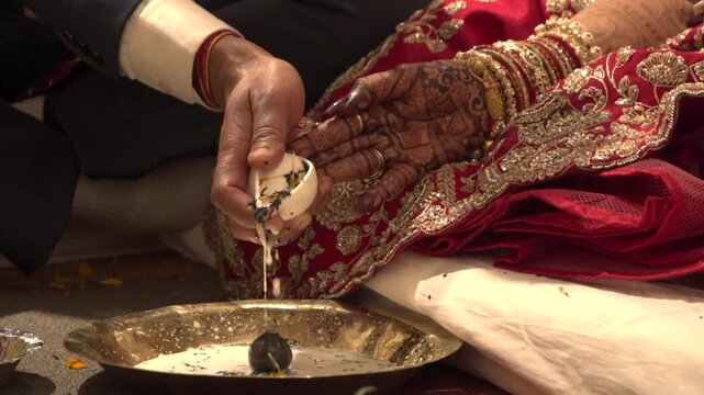 Sacred Fire Witnessing Seven Vows of Indian Wedding Couple