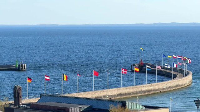 Set of European flags in the wind in Helsingborg port, Sweden