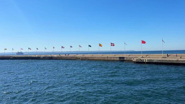 Set of European flags in the wind in Helsingborg port, Sweden
