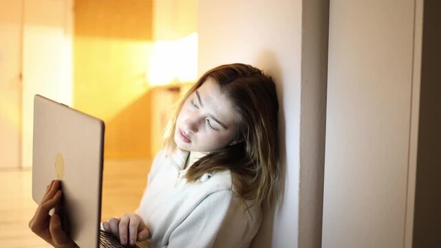 Exhausted woman falling asleep while working on laptop late evening home office burnout fatigue low productivity overwork tired routine digital lifestyle stress